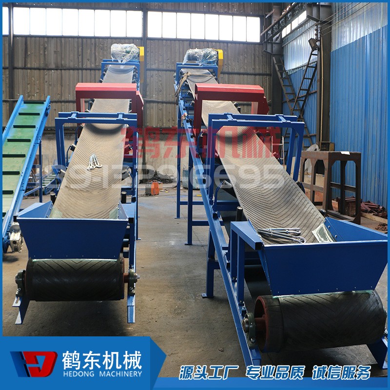 廠家定做爬坡上料輸送機流水線 工業(yè)傳送帶 不銹鋼板式輸送機