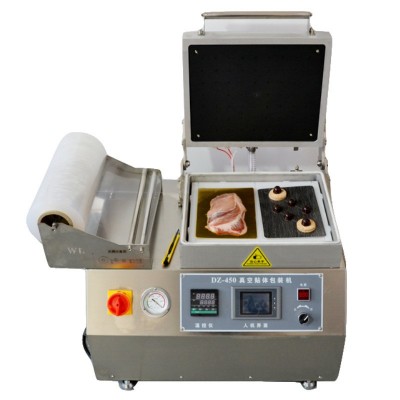 山東諸城供應(yīng)三文魚真空貼體包裝機家用商用海鮮牛肉貼體包裝機