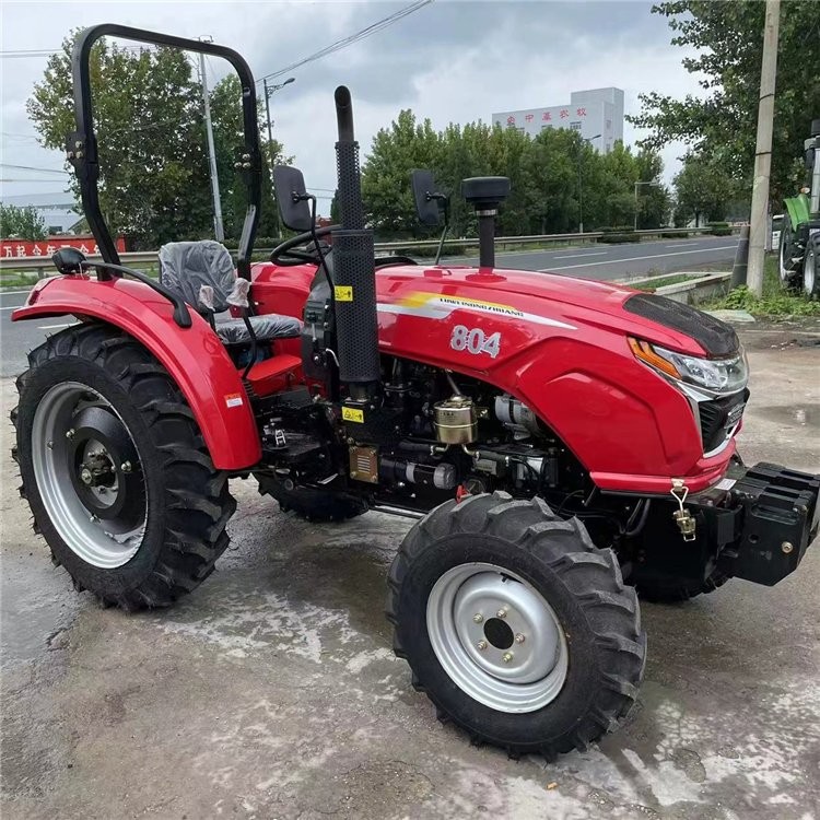 東方紅動力704四缸柴油拖拉機 液壓轉(zhuǎn)向靈活打地機 可懸掛各種農(nóng)具