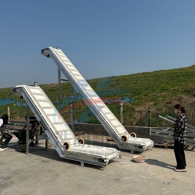 白色PVC裙邊皮帶輸送機帶隔板顆粒粉末提升輸送機水平傾斜上料機